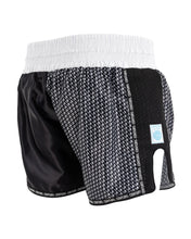 Black and white kickboxing shorts with textured pattern panel and elastic waistband