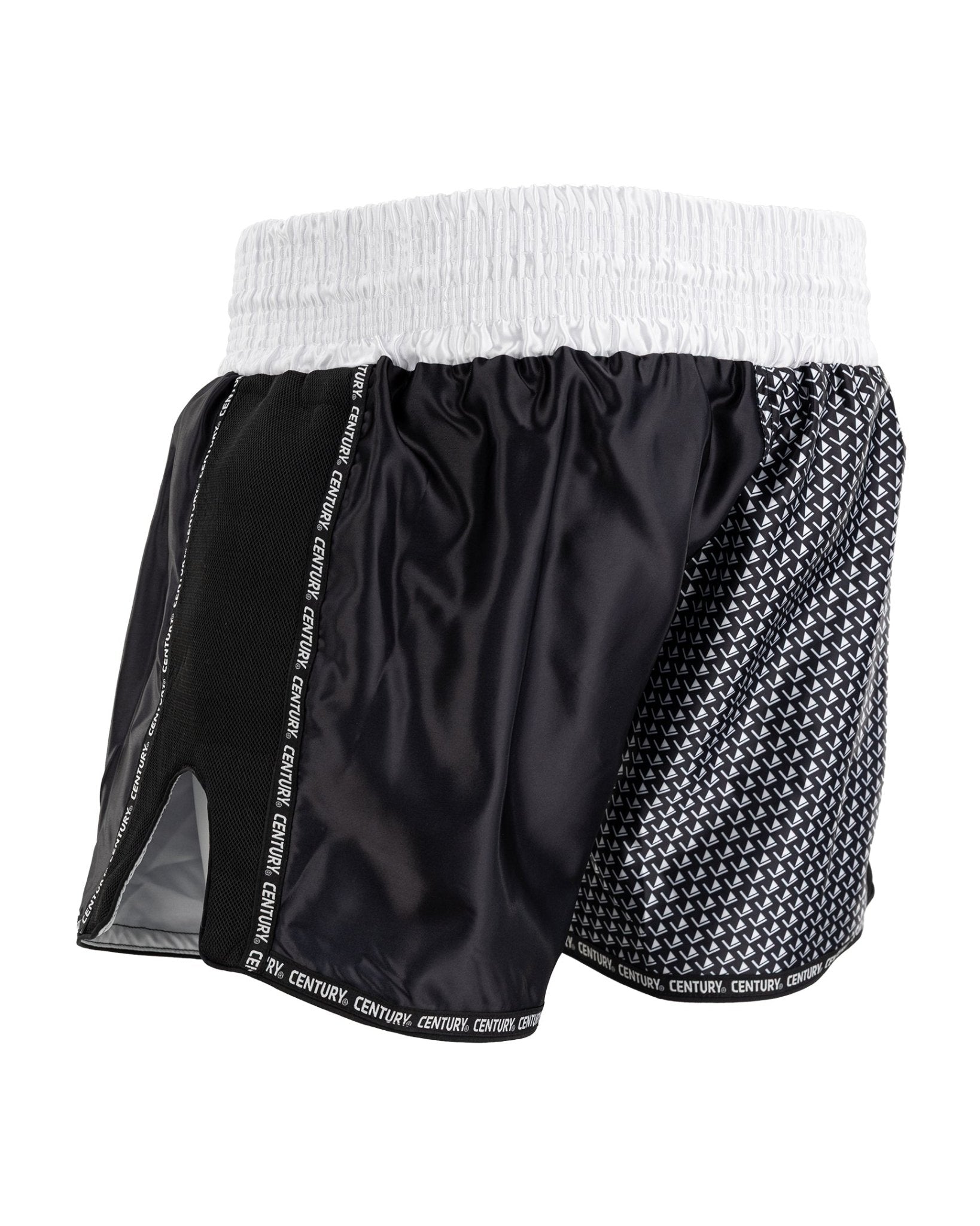 Black and white kickboxing shorts with black satin-style panel and textured side panel