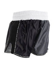 Black and white kickboxing shorts with black satin-style panel and textured side panel