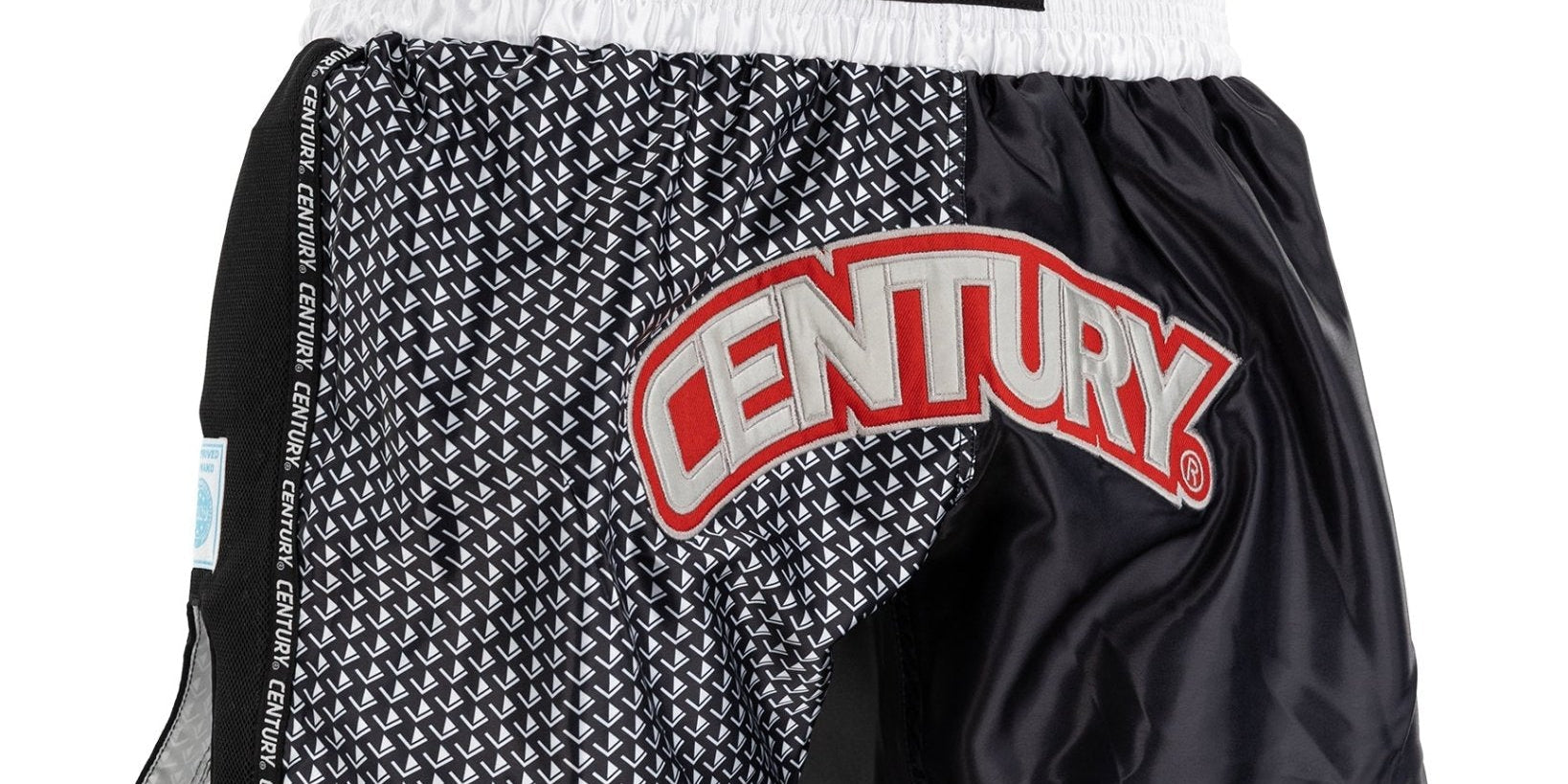 Kick boxing shorts with white waistband, black-and-white pattern, and CENTURY logo