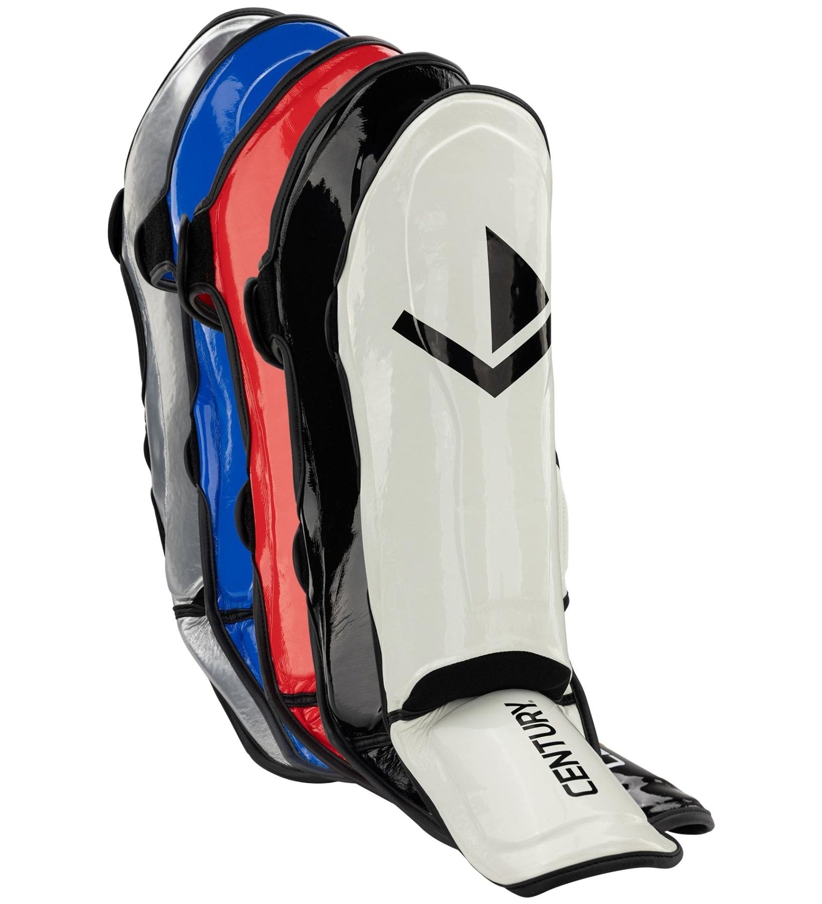 Pair of shin guards in white, black, blue, and red with black straps and V-logo